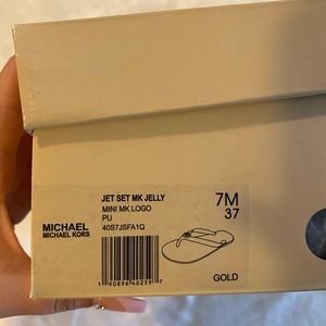 Michael Kors Brown and Gold jelly Flipflop